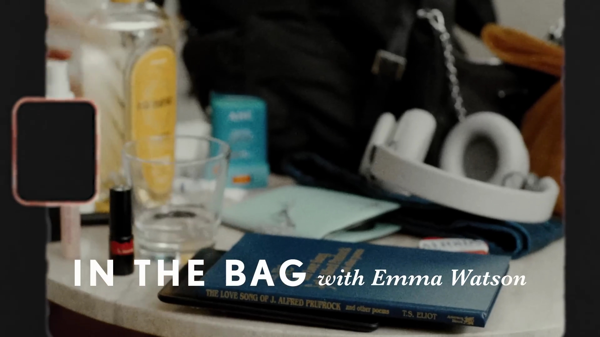 EmmaWatsonFan-dot-nl-2023Vouge-InsideEmmasPradaBackpack0012.jpg
