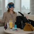 EmmaWatsonFan-dot-nl-2023Vouge-InsideEmmasPradaBackpack0000.jpg