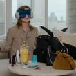 EmmaWatsonFan-dot-nl-2023Vouge-InsideEmmasPradaBackpack0001.jpg