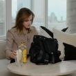 EmmaWatsonFan-dot-nl-2023Vouge-InsideEmmasPradaBackpack0055.jpg